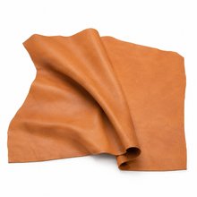 Load image into Gallery viewer, Orange leather sample on a white background
