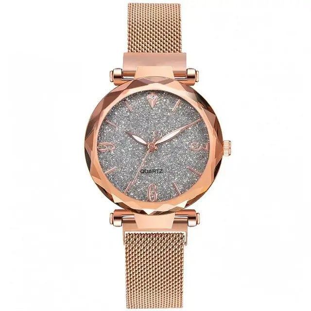 Elegant rose gold women's watch with a glittery dial and mesh strap, perfect for adding sophistication to both casual and formal outfits.