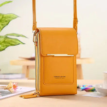 Load image into Gallery viewer, Luxury mustard leather crossbody bag on table, elegant design, perfect for versatile style.

