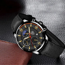 Load image into Gallery viewer, Men&#39;s Casual Leather Watch with black dial and gold accents, showcasing timeless elegance and modern functionality.
