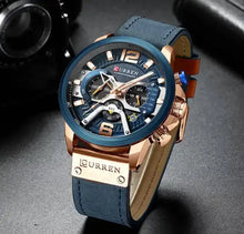 Load image into Gallery viewer, Curren Chrono Edition 2022 leather watch with gold accents and navy strap, highlighting luxury and durability.
