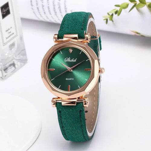 Fashion women leather watch with green face and vegan leather strap, sleek quartz movement, casual style.