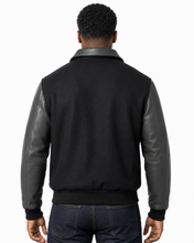 Load image into Gallery viewer, REED Men's Executive Varsity Jacket with cowhide leather sleeves and wool body, union-made in the USA, worn by a model.
