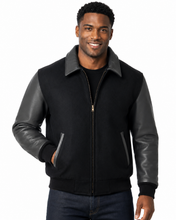 Load image into Gallery viewer, REED Men's Executive Varsity Jacket with cowhide leather sleeves and wool body, union-made in the USA, worn by a model.
