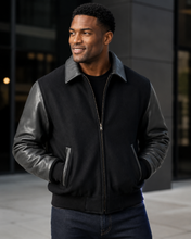 Load image into Gallery viewer, REED Men's Executive Varsity Jacket with leather cowhide sleeves and wool body, union made in USA, worn by male model.
