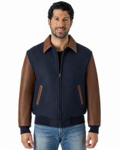 Load image into Gallery viewer, REED Men's Executive Varsity Jacket with cowhide leather sleeves and wool body, union-made in the USA, worn by a model.
