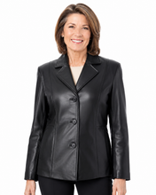 Charger l'image dans la galerie, A woman wearing a black real-leather blazer with a notched lapel and three front buttons, shown against a plain white background.
