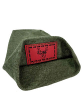 Cargar imagen en el visor de la galería, Reindeer Limited Edition Christmas Beanie with festive green knit and red patch, part of Haakwear’s exclusive 2025 collection.
