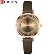 Load image into Gallery viewer, Classic Clock Leather Watch for women with brown leather strap and gold-tone clockface, featuring quartz movement and water resistance.
