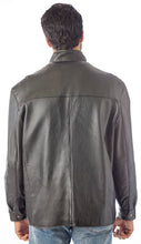 Cargar imagen en el visor de la galería, Man wearing a dark gray leather jacket on a white background
