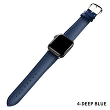 Charger l&#39;image dans la galerie, Deep blue leather band for Apple Watch, compatible with Series 1-5, shown with watch. Elegant design for 38-44mm models.
