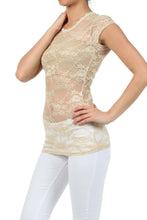 Load image into Gallery viewer, Model wearing stretch floral lace cap sleeve tunic length tee in beige, showcasing sheer lace design and slim fit. Made in USA.
