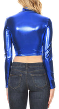 Charger l&#39;image dans la galerie, Back view of a metallic blue mock neck long sleeve crop top paired with denim jeans, showcasing shiny fabric and modern style, Made in USA.
