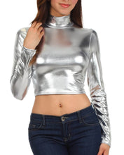 Charger l&#39;image dans la galerie, Woman wearing a metallic liquid mock neck turtleneck long sleeve crop top, styled with jeans. Made in USA fashion.

