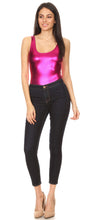 Load image into Gallery viewer, Woman wearing a pink metallic gymnastics dance party leotard bodysuit and jeans, posing confidently against a white background.
