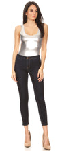 Load image into Gallery viewer, Silver metallic leotard bodysuit worn with jeans, showcasing women&#39;s gymnastics and dance fashion. Made in USA.
