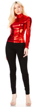 Charger l&#39;image dans la galerie, Model wearing a red metallic liquid mock neck turtleneck long sleeve top, paired with black pants, showcasing a stylish USA-made outfit.
