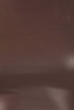 Load image into Gallery viewer, Close-up of matte brown fabric texture from a liquid mock neck turtleneck crop top, showcasing smooth and shiny material.
