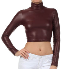 Load image into Gallery viewer, Matte maroon mock neck long sleeve crop top with sleek finish, paired with white jeans. Made in USA fashion statement.
