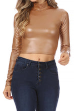 Load image into Gallery viewer, Matte liquid mock neck turtleneck crop top with long sleeves, made in USA, styled with high-waisted jeans.
