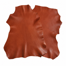 Cargar imagen en el visor de la galería, Two Whiskey Reed Sheepskins leather hide on a white background
