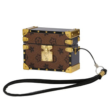 Cargar imagen en el visor de la galería, Elegant brown leather AirPods Pro case with stylish strap and gold accents.
