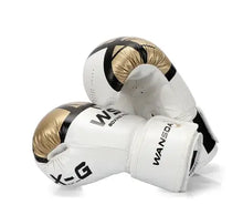 Load image into Gallery viewer, Premium white and gold adult kickboxing gloves made from PU leather, featuring an adjustable wrist strap for comfort and durability.
