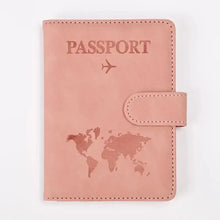 Load image into Gallery viewer, PU leather passport holder with world map design in pink, vegan and imported, stylish travel accessory for organizing essentials.

