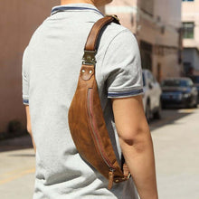 Load image into Gallery viewer, Man wearing Wagner Leather Waist Bag | Full Grain Leather Fanny Pack outdoors.
