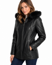 Load image into Gallery viewer, Woman wearing a reed black leather jacket with fur hood on a white background
