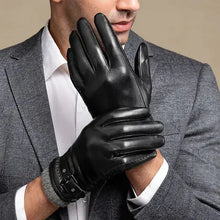 Load image into Gallery viewer, Man wearing stylish men&#39;s winter leather gloves in black, combining warmth and sophistication, perfect for cold weather fashion.

