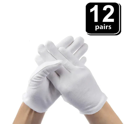 Hands wearing soft white cotton gloves, 12 pairs set, perfect for sensitive skin and delicate tasks, premium comfort and protection.