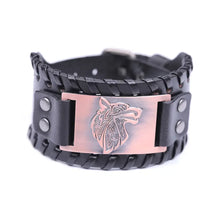 Load image into Gallery viewer, Vintage wide leather woven bracelet with intricately crafted wolf head centerpiece symbolizing strength and independence.
