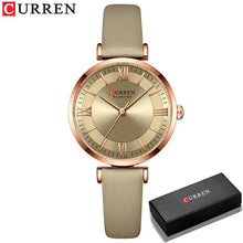 Load image into Gallery viewer, Elegant women&#39;s leather wristwatch with classic clockface and quartz movement from Curren. Includes black gift box packaging.
