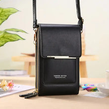 Load image into Gallery viewer, Stylish 2-in-1 black leather bag converting from handbag to crossbody, showcasing premium craftsmanship and versatility on a wooden table.
