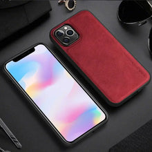 Load image into Gallery viewer, Luxury red leather iPhone case with TPU frame offering premium protection and elegance, showcased on a sleek black background.
