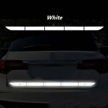 Load image into Gallery viewer, White reflective tape on car rear for increased night visibility and safety, automotive accessory for enhanced road presence.
