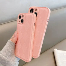Cargar imagen en el visor de la galería, Pink vegan leather phone cases with diamond pattern, showcasing rounded corners and slim design for stylish protection.
