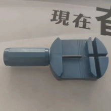 Load image into Gallery viewer, Blue watch strap tool with handle and grooved base, used for adjusting watch bands, on a background with Chinese characters.

