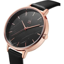 Load image into Gallery viewer, Elegantly designed women&#39;s fashion watch with a sleek black face and gold accents, perfect for enhancing any outfit.
