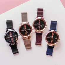 Load image into Gallery viewer, Four Galaxy Starsa watches with shimmering dials and mesh straps in black, rose gold, purple, and blue. Elegant yet not waterproof.
