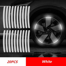 Load image into Gallery viewer, White reflective car wheel hub safety stripes with 20 pieces shown on a black vehicle for enhanced road visibility.
