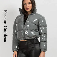 Load image into Gallery viewer, Woman wearing Shiny PU Leather Winter Jacket in grey with glossy finish, vegan leather, stylish coat ideal for cold weather, by Passion Goddess.
