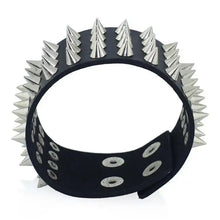 Load image into Gallery viewer, Edgy faux leather bracelet with silver spikes, perfect for adding a bold, punk-inspired touch to any outfit.
