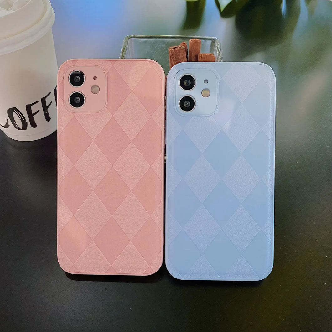 Pink and blue retro leather phone cases with a diamond pattern, showcasing stylish and durable vegan PU leather design by Jelly Cases.