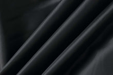 Load image into Gallery viewer, Close-up of black genuine leather fabric with smooth texture, perfect for men&#39;s bomber jackets.
