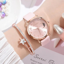 Cargar imagen en el visor de la galería, Elegant Moon Bracelet &amp; Watch Set with pink dial and celestial charm on woman&#39;s wrist, perfect for adding sophistication and flair.
