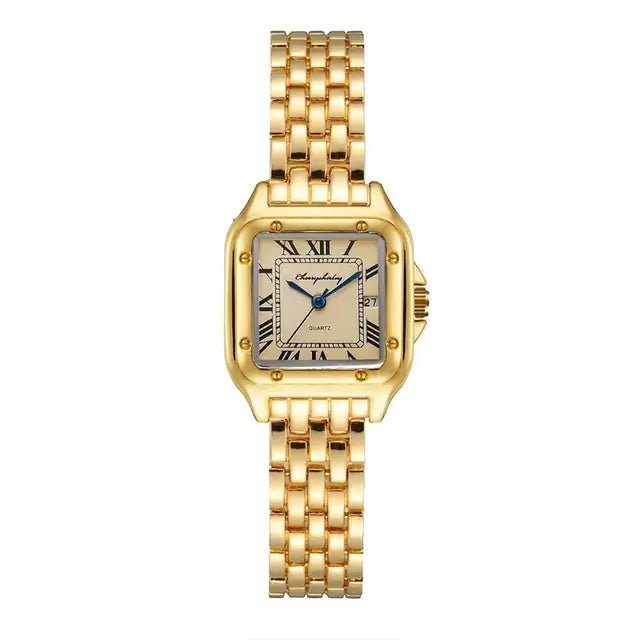 Luxury gold couple's watch with Roman numerals and elegant link bracelet, symbolizing timeless love and exquisite craftsmanship.