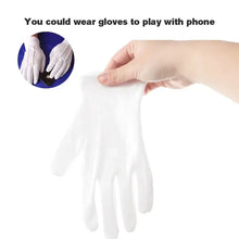 Load image into Gallery viewer, Soft white cotton glove held in hand, ideal for delicate tasks and touchscreen use.

