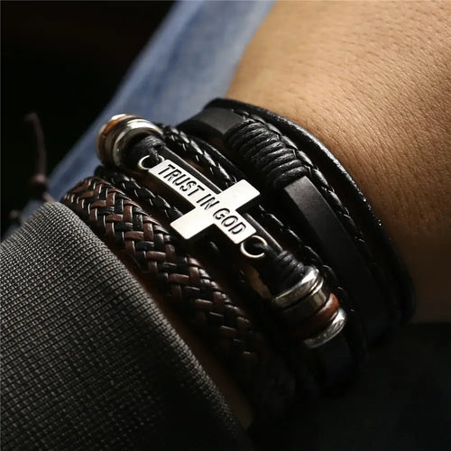 Men's leather bracelets with 'Trust in God' charm, showcasing rugged style and unique design for casual or formal wear.